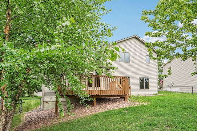 1504 Monarch St, Shakopee, MN 55379 - rear view of property with a deck and a fenced backyard