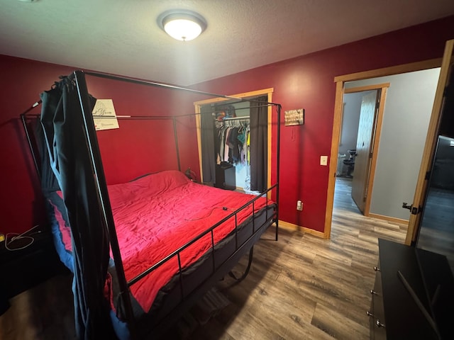 1101 Timbers Dr, Park Rapids, MN 56470 - bedroom with wood finished floors and baseboards