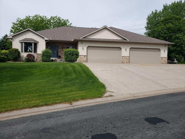 1115 Trappers Xing, Lino Lakes, MN 55038 - ranch-style house featuring a garage, concrete driveway, a front lawn, a shingled roof, and stone siding