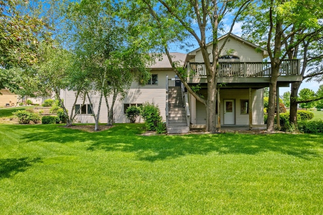 1115 Trappers Xing, Lino Lakes, MN 55038 - rear view of house with a deck, a yard, and stairway