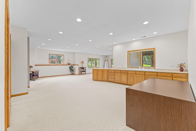 1115 Trappers Xing, Lino Lakes, MN 55038 - kitchen featuring recessed lighting, light carpet, open floor plan, and light countertops
