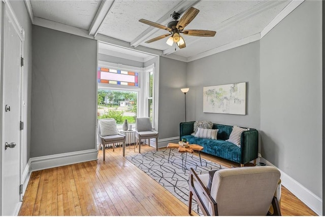 608 Beaumont St, Saint Paul, MN 55130 - sitting room featuring light wood finished floors, baseboards, and beam ceiling