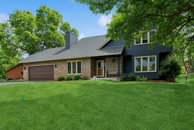 3720 Ximines Ln N, Plymouth, MN 55441 - view of front of property featuring a front yard, an attached garage, and a chimney