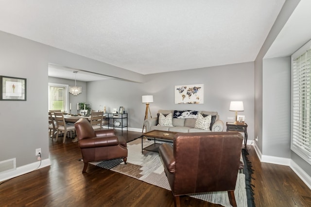 3720 Ximines Ln N, Plymouth, MN 55441 - living area featuring wood finished floors and a chandelier