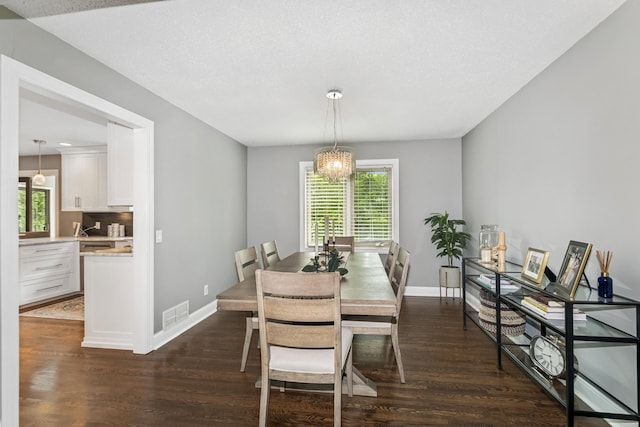 3720 Ximines Ln N, Plymouth, MN 55441 - dining room featuring dark wood-type flooring and a chandelier