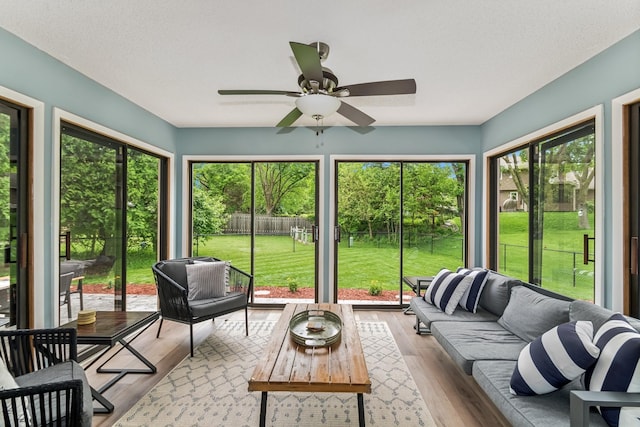3720 Ximines Ln N, Plymouth, MN 55441 - sunroom with an outdoor living space and a ceiling fan