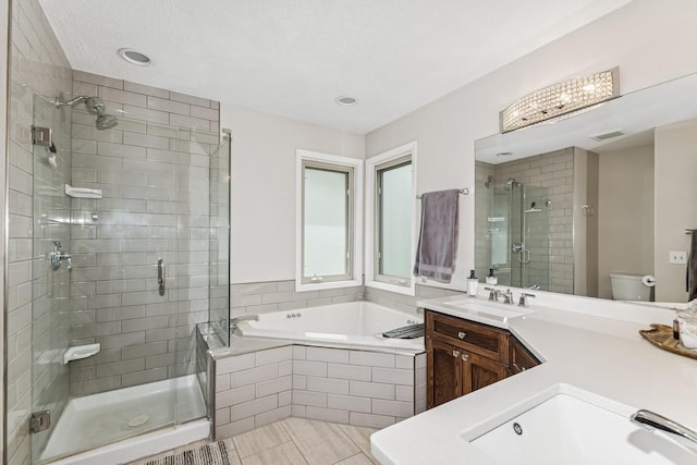 3720 Ximines Ln N, Plymouth, MN 55441 - bathroom with a shower stall, a bath, vanity, tile patterned flooring, and recessed lighting