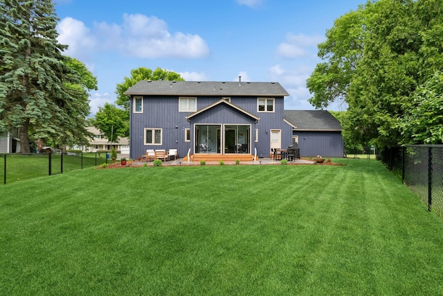 3720 Ximines Ln N, Plymouth, MN 55441 - back of house with a patio, a fenced backyard, and a shingled roof