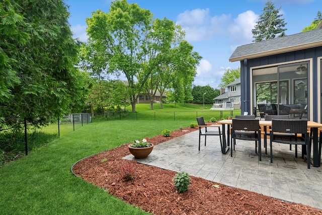 3720 Ximines Ln N, Plymouth, MN 55441 - fenced backyard featuring a patio area and outdoor dining area