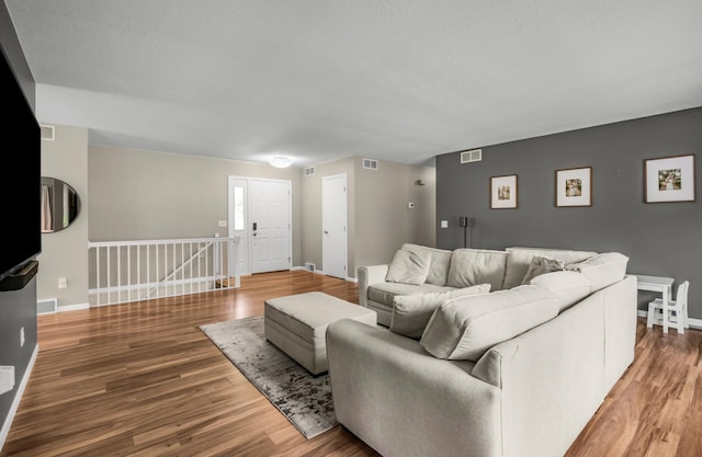 324 Meadow Run Dr SW, Rochester, MN 55902 - living room with wood finished floors and baseboards