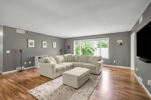 324 Meadow Run Dr SW, Rochester, MN 55902 - living room featuring wood finished floors and baseboards