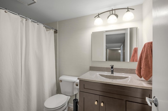 324 Meadow Run Dr SW, Rochester, MN 55902 - bathroom featuring vanity, toilet, and curtained shower