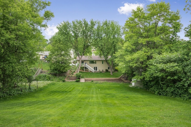 324 Meadow Run Dr SW, Rochester, MN 55902 - view of green lawn featuring stairs