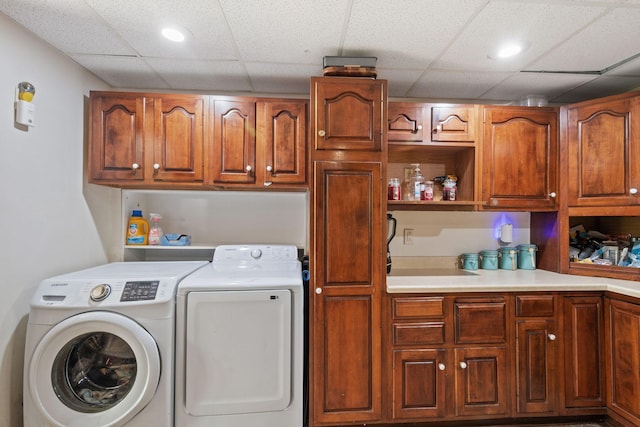 2065 124th Ln NW, Coon Rapids, MN 55448 - washroom with washer and clothes dryer, cabinet space, and recessed lighting