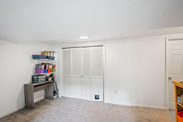 2065 124th Ln NW, Coon Rapids, MN 55448 - unfurnished bedroom featuring carpet floors, a closet, and baseboards