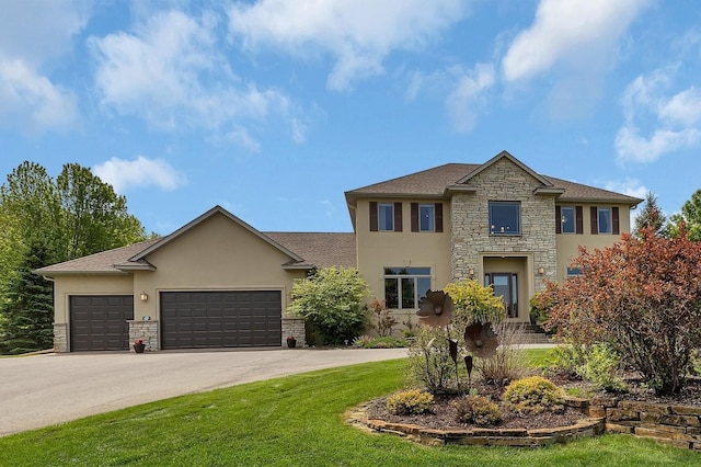 2508 Walden Way, Saint Cloud, MN 56301 - view of front of house with stone siding, stucco siding, concrete driveway, and an attached garage