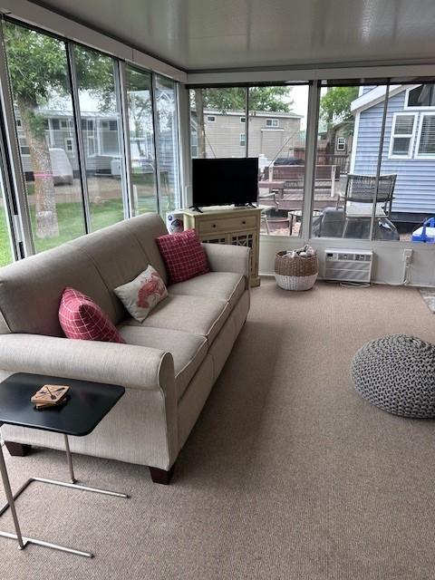 2221 Reubens Ln SW Unit 20, Farwell, MN 56327 - sunroom / solarium with a wall mounted air conditioner