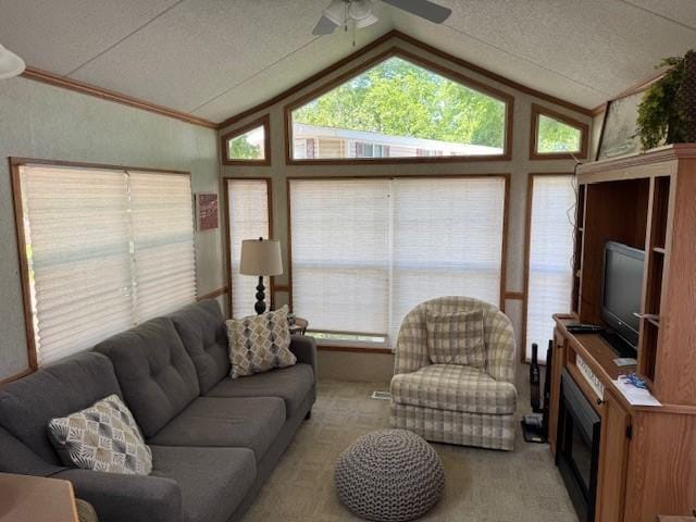 2221 Reubens Ln SW Unit 20, Farwell, MN 56327 - living room with vaulted ceiling, a ceiling fan, light colored carpet, healthy amount of natural light, and crown molding