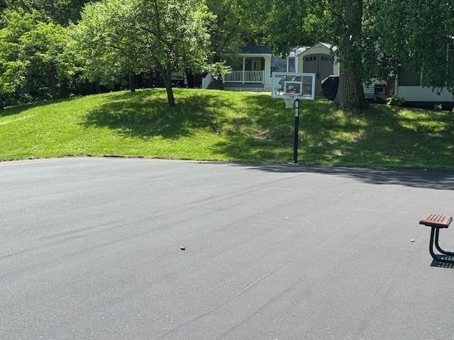 2221 Reubens Ln SW Unit 20, Farwell, MN 56327 - view of basketball court with a lawn