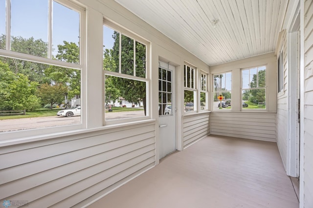 406 4th Ave NW, Barnesville, MN 56514 - unfurnished sunroom featuring wooden walls