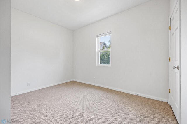406 4th Ave NW, Barnesville, MN 56514 - spare room featuring carpet and baseboards