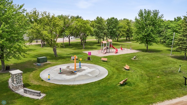 406 4th Ave NW, Barnesville, MN 56514 - surrounding community with a lawn and view of scattered trees