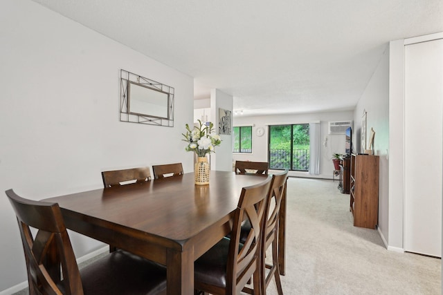 5697 Green Circle Dr Unit 216, Minnetonka, MN 55343 - dining area featuring light colored carpet and baseboards