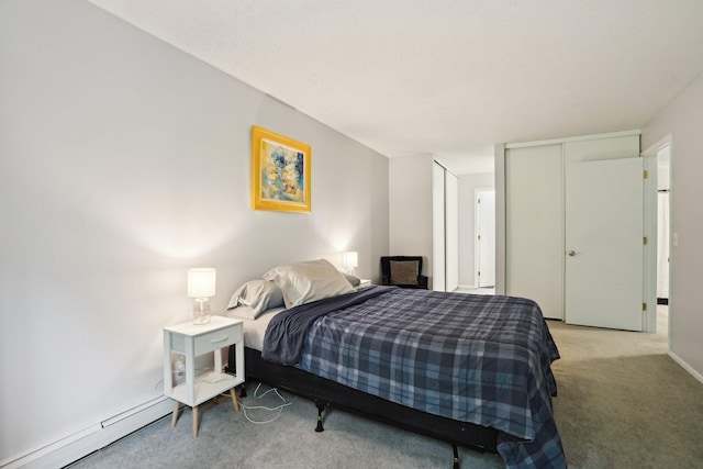 5697 Green Circle Dr Unit 216, Minnetonka, MN 55343 - carpeted bedroom with a baseboard radiator