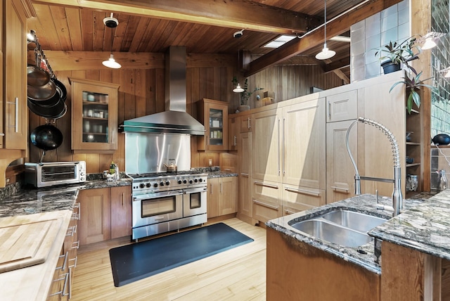 2867 Burnham Blvd, Minneapolis, MN 55416 - kitchen with range with two ovens, wall chimney exhaust hood, wood ceiling with exposed beams, a sink, and light wood-style floors