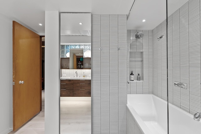 2867 Burnham Blvd, Minneapolis, MN 55416 - bathroom featuring vanity, decorative backsplash, and recessed lighting