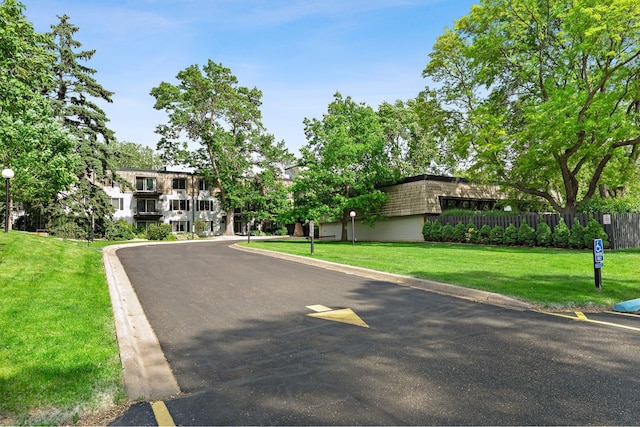 183 Little Canada Rd E Unit 310, Little Canada, MN 55117 - view of asphalt street featuring curbs and street lights
