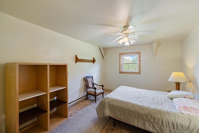 11556 Blackwood Rd, Floodwood Twp, MN 55736 - carpeted bedroom featuring a baseboard radiator and ceiling fan