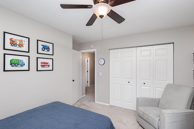 2205 Valders Ave N, Golden Valley, MN 55427 - bedroom with light colored carpet, a closet, and ceiling fan