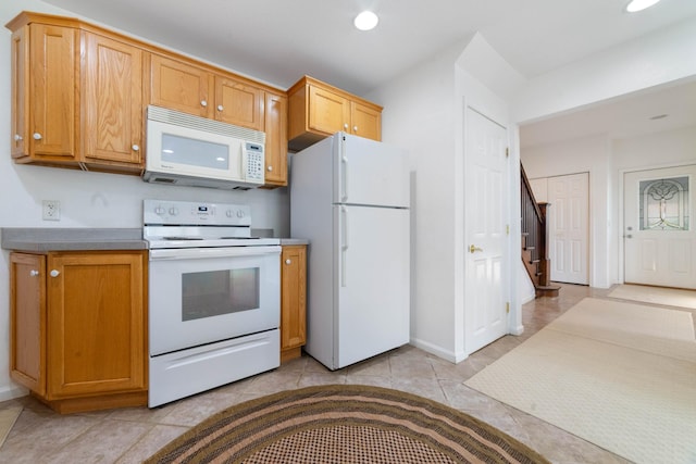 601 22nd Ave W, Duluth, MN 55806 - kitchen with white appliances, recessed lighting, light tile patterned flooring, and baseboards