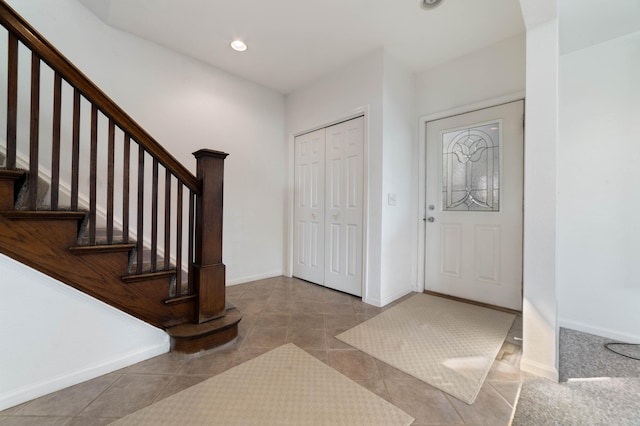 601 22nd Ave W, Duluth, MN 55806 - entrance foyer with stairs, recessed lighting, tile patterned floors, and baseboards