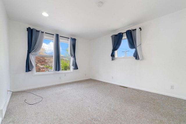 601 22nd Ave W, Duluth, MN 55806 - spare room with carpet floors, a smoke detector, baseboards, and recessed lighting