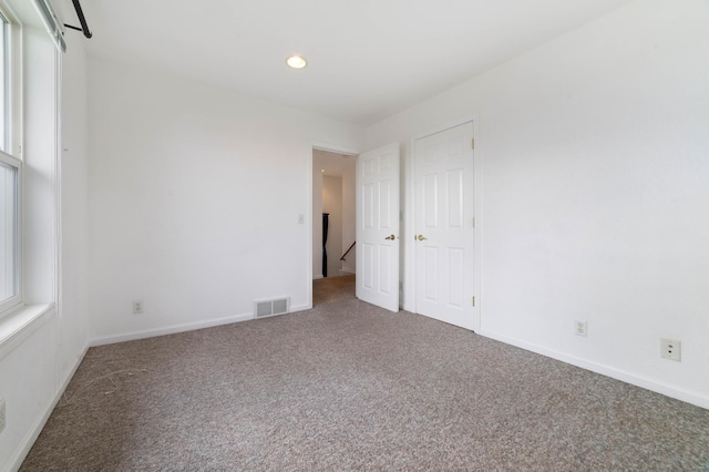 601 22nd Ave W, Duluth, MN 55806 - carpeted spare room featuring baseboards and recessed lighting