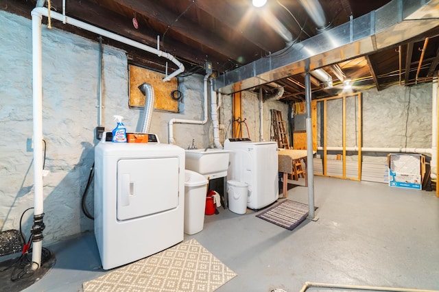 601 22nd Ave W, Duluth, MN 55806 - unfinished below grade area with washer and dryer and a sink