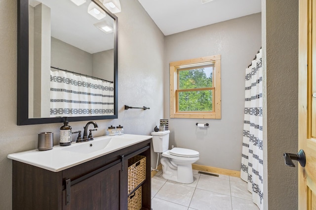 1268 Nellie Lake Ln NE, Longville, MN 56655 - full bathroom with toilet, vanity, tile patterned flooring, baseboards, and curtained shower