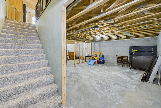 1268 Nellie Lake Ln NE, Longville, MN 56655 - unfinished basement with stairs and concrete block wall