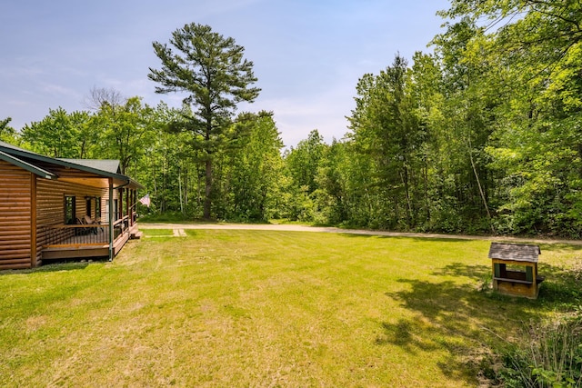 1268 Nellie Lake Ln NE, Longville, MN 56655 - view of grassy yard with a view of trees
