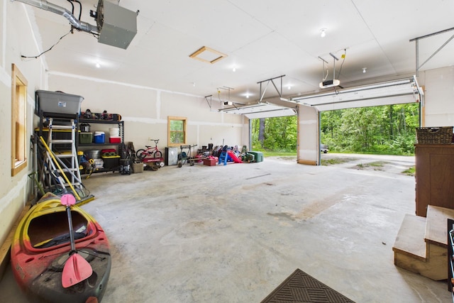 1268 Nellie Lake Ln NE, Longville, MN 56655 - garage featuring a garage door opener
