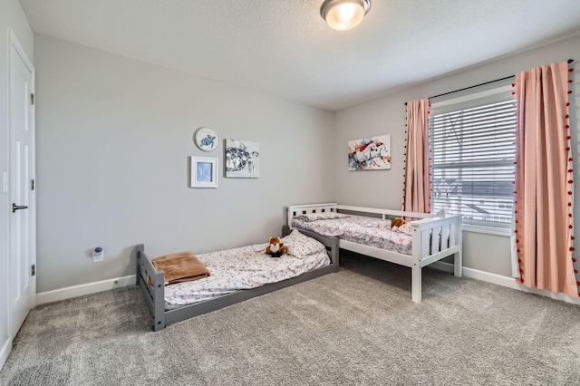 9602 7th St N, Lake Elmo, MN 55042 - carpeted bedroom featuring baseboards and a textured ceiling