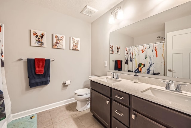 9602 7th St N, Lake Elmo, MN 55042 - bathroom with double vanity, baseboards, toilet, tile patterned flooring, and curtained shower