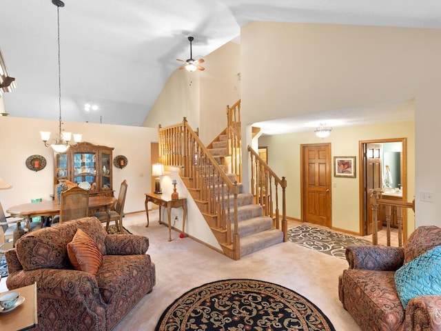 9160 164th Ln NW, Ramsey, MN 55303 - carpeted living room featuring a chandelier, stairway, a ceiling fan, high vaulted ceiling, and baseboards