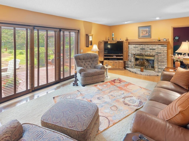 9160 164th Ln NW, Ramsey, MN 55303 - living area with a brick fireplace and recessed lighting