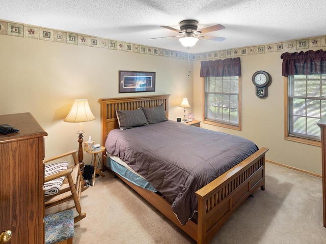 9160 164th Ln NW, Ramsey, MN 55303 - bedroom featuring carpet flooring, a textured ceiling, a ceiling fan, and baseboards