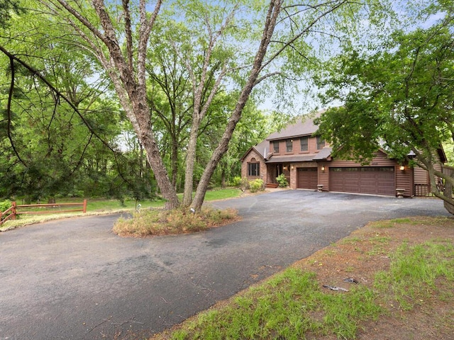 9160 164th Ln NW, Ramsey, MN 55303 - view of front of property featuring driveway and a garage
