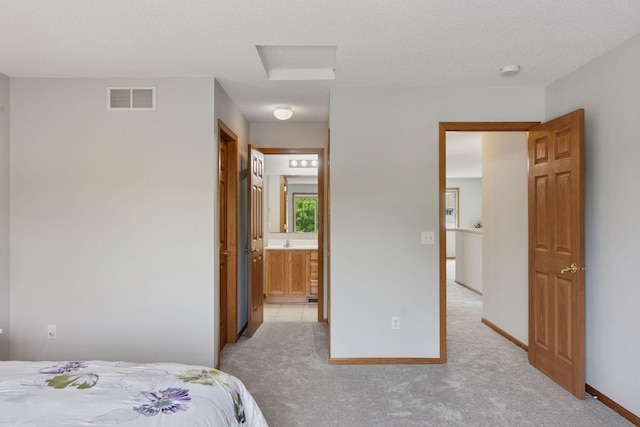 1848 111th Ave NE, Blaine, MN 55449 - bedroom featuring light colored carpet, attic access, and baseboards