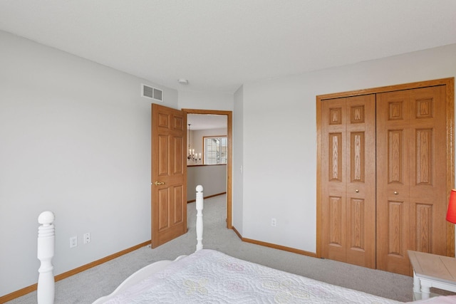 1848 111th Ave NE, Blaine, MN 55449 - bedroom featuring baseboards, light carpet, and a closet